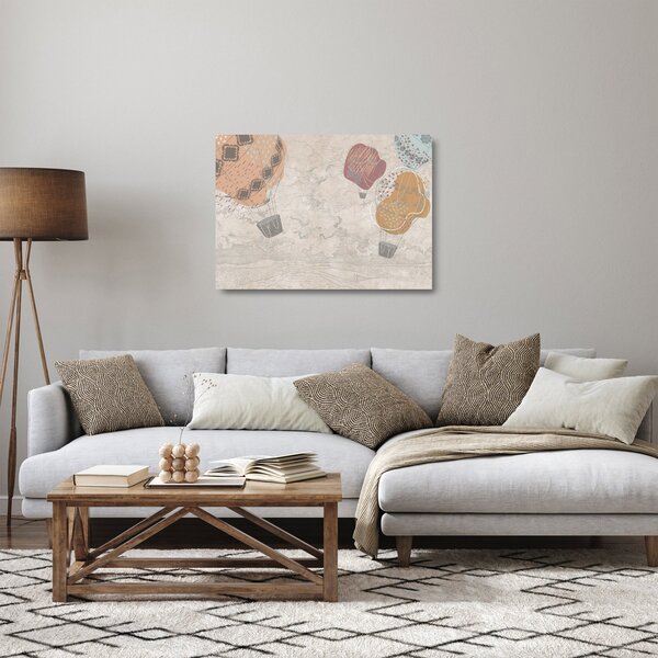 Obraz na szkle - Balony nad miastem, ciepłe odcienie (70x50 cm)