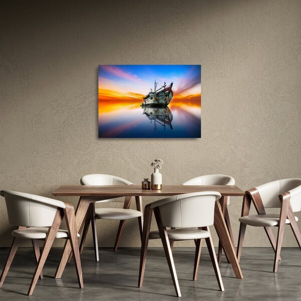 Obraz na szkle - Wschód słońca nad wrakiem łodzi (70x50 cm)