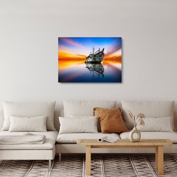 Obraz na szkle - Wschód słońca nad wrakiem łodzi (70x50 cm)