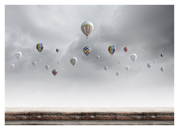 Obraz na szkle - Balony nad ceglaną ścianą (70x50 cm)
