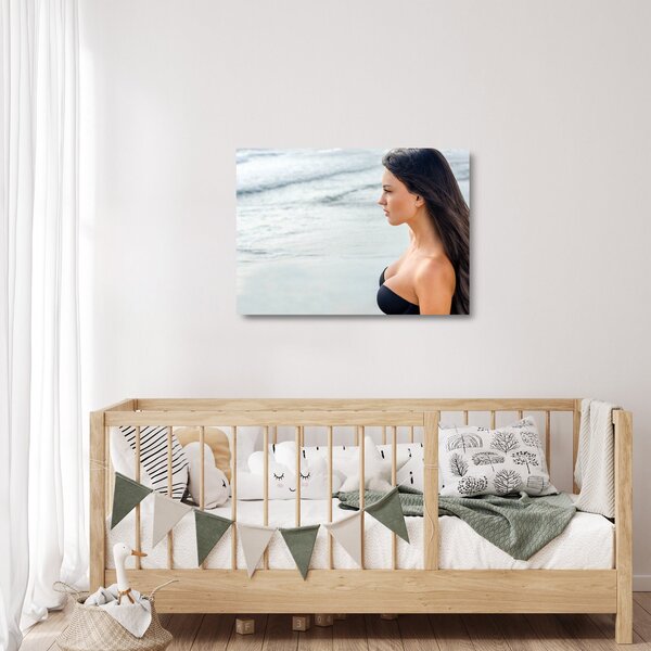 Obraz na szkle kobiety na plaży (70x50 cm)