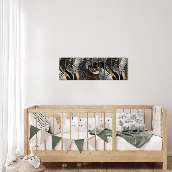 Obraz - Tropikalne liście w kolorze czarno - złotym (z zegarem) (90x30 cm)