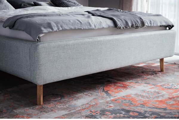 Szaroniebieskie tapicerowane łóżko dwuosobowe ze schowkiem ze stelażem 180x200 cm Lotte – Meise Möbel