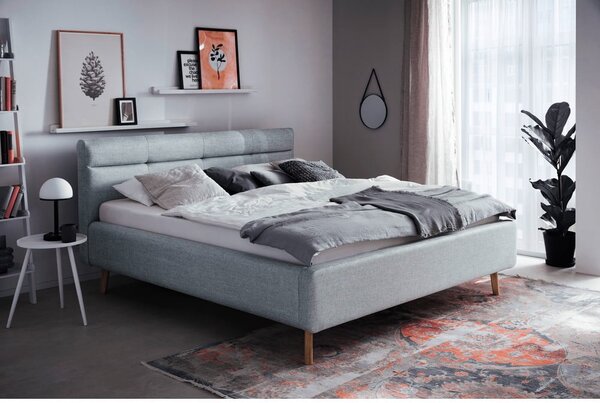 Szaroniebieskie tapicerowane łóżko dwuosobowe ze schowkiem ze stelażem 180x200 cm Lotte – Meise Möbel