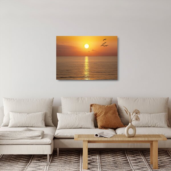 Obraz na szkle - Zachód słońca nad oceanem (70x50 cm)