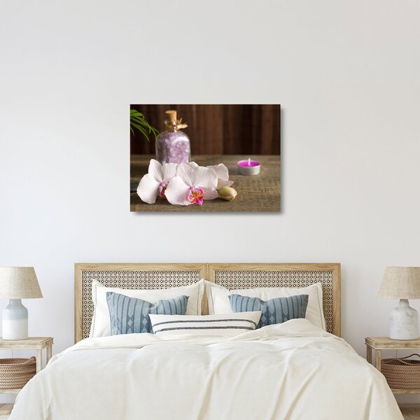 Obraz na szkle - Świeca i orchidee (70x50 cm)
