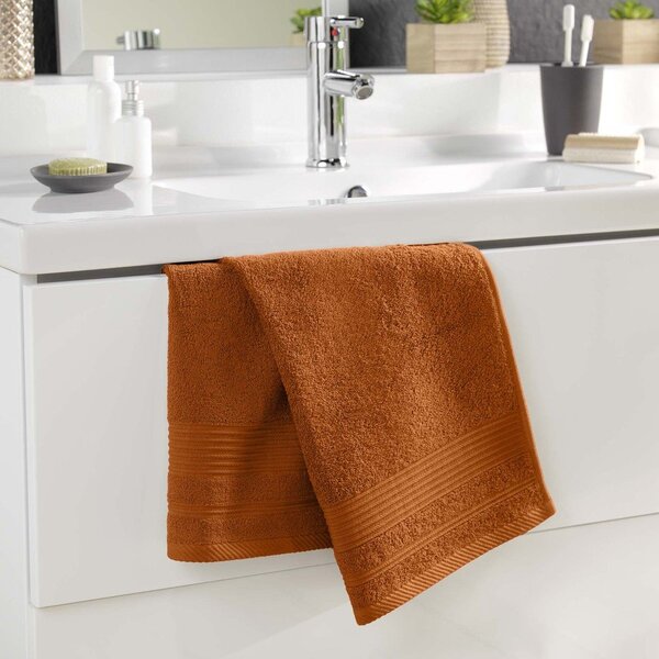 Bawełniany ręcznik frotte w kolorze terakoty 50x90 cm Tendresse – douceur d'intérieur