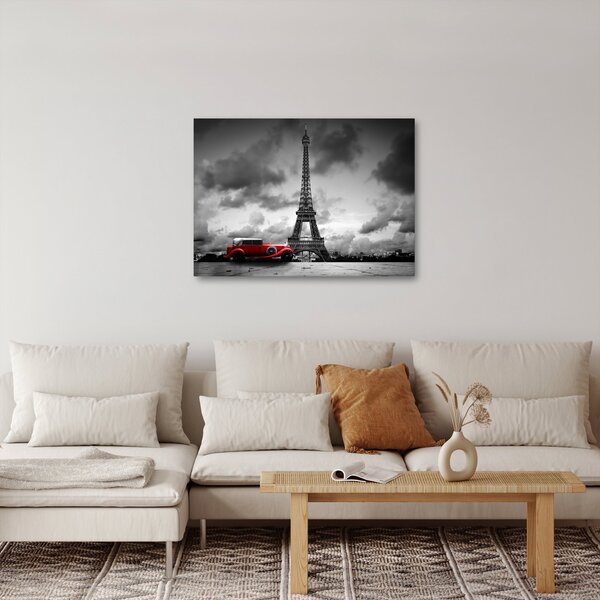 Obraz - Wieża Eiffla i czerwony samochód (70x50 cm)