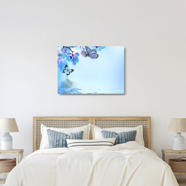 Obraz na szkle - Motyl na kwiatach orchidei, niebieski (70x50 cm)