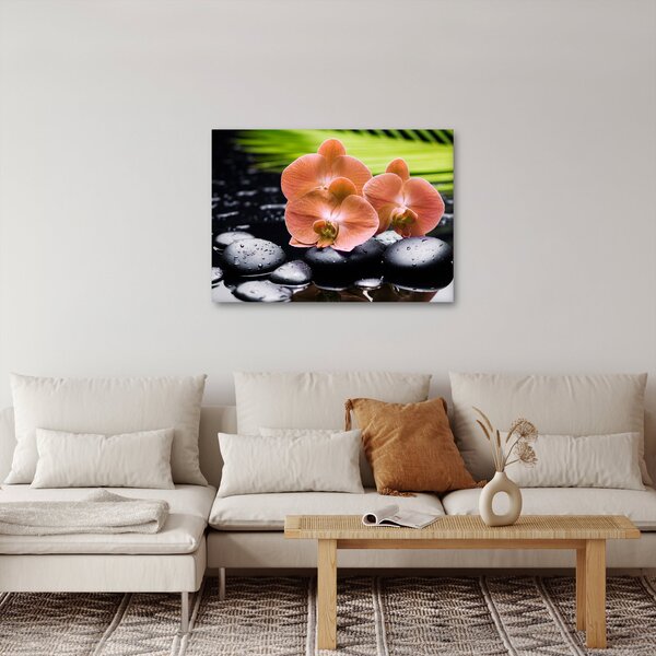 Obraz - Pomarańczowa orchidea z liśćmi palmy (70x50 cm)