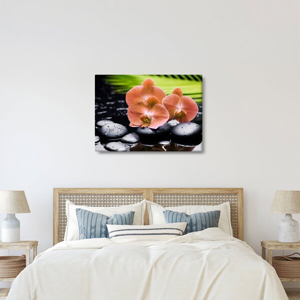 Obraz - Pomarańczowa orchidea z liśćmi palmy (70x50 cm)