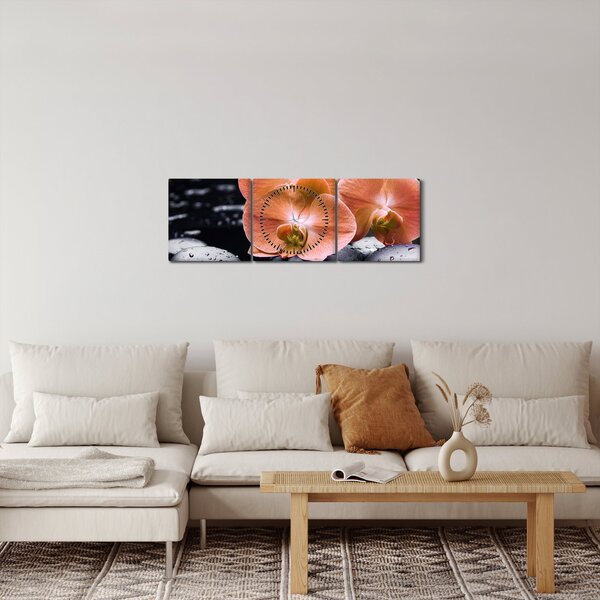 Obraz - Pomarańczowa orchidea z liśćmi palmy (z zegarem) (90x30 cm)