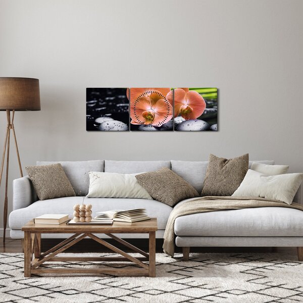 Obraz - Pomarańczowa orchidea z liśćmi palmy (z zegarem) (90x30 cm)