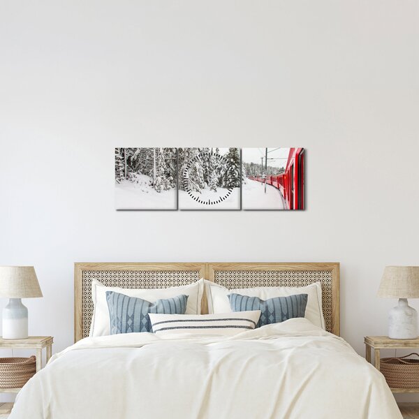 Obraz - Pociąg w zaśnieżonym krajobrazie (z zegarem) (90x30 cm)
