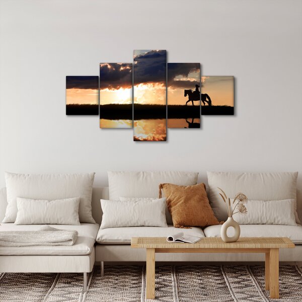 Obraz - Jeździec na koniu o zachodzie słońca (125x70 cm)