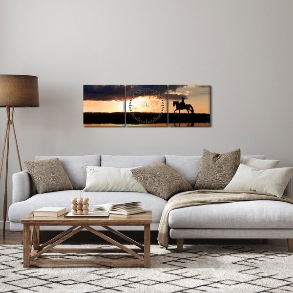 Obraz - Jeździec na koniu o zachodzie słońca (z zegarem) (90x30 cm)