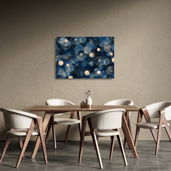 Obraz na szkle - Niebiesko-złote pierścienie (70x50 cm)