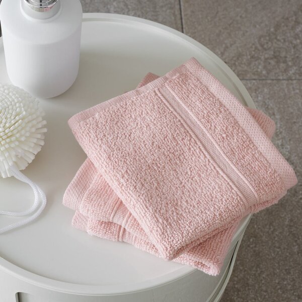 Jasnoróżowe bawełniane ręczniki frotte zestaw 2 szt. 30x30 cm Zero Twist – Catherine Lansfield