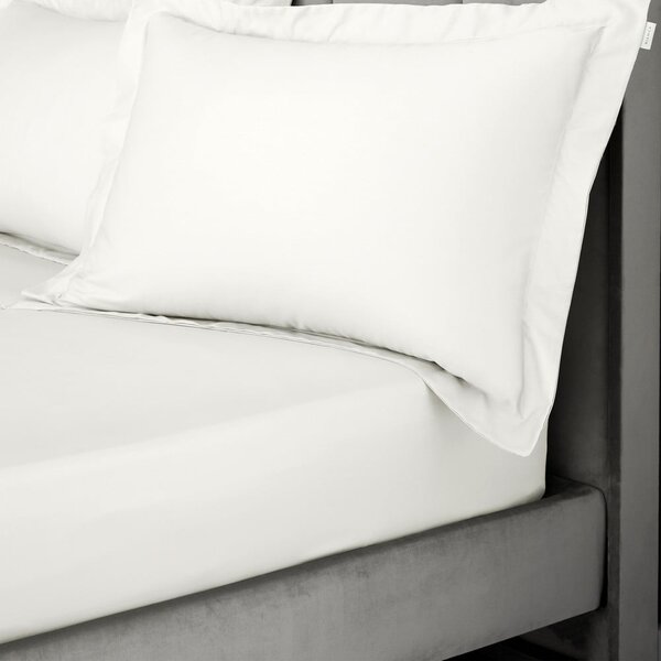 Prześcieradło z satyny bawełnianej z gumką w kolorze kości słoniowej 90x190 cm Cotton Sateen – Bianca