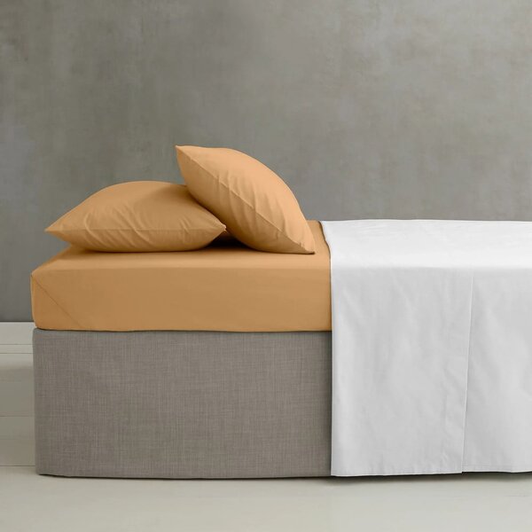 Żółtopomarańczowe prześcieradło z perkalu z gumką 90x190 cm Easy Iron Percale – Catherine Lansfield