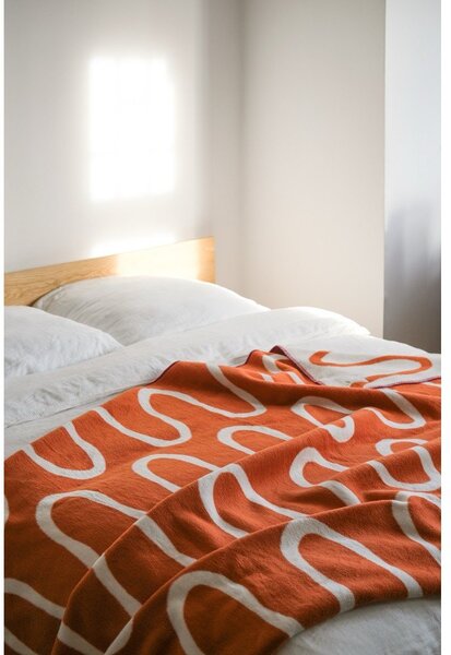 Pomarańczowy koc 150x200 cm Swirl – noo.ma