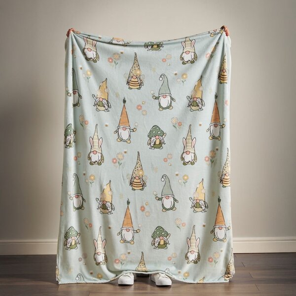 Jasnozielony koc z wielkanocnym motywem z mikropluszu 130x170 cm Spring Gonks – Catherine Lansfield