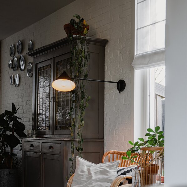 Designerska lampa ścienna czarna regulowana - Triangolo