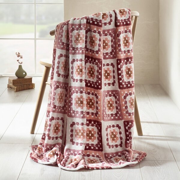 Różowy koc z mikropluszu 130x170 cm Crochet Print – Catherine Lansfield