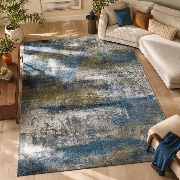 Niebieski dywan Universal Kalia Abstract, 120x170 cm