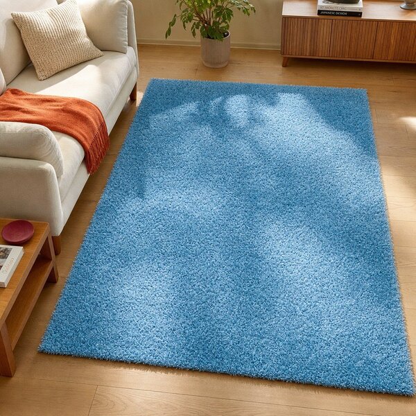 Niebieski dywan Universal Aqua Liso, 57x110 cm