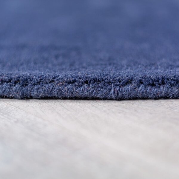 Niebieski wełniany okrągły dywan tkany ręcznie ø 150 cm Mia Segment – Flair Rugs
