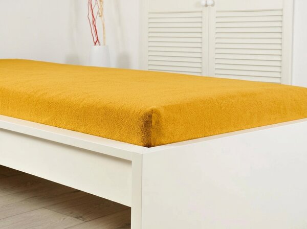 Frotte prześcieradło do dziecięcego łóżeczka PREMIUM 60x120 cm żółto-pomarańczowe