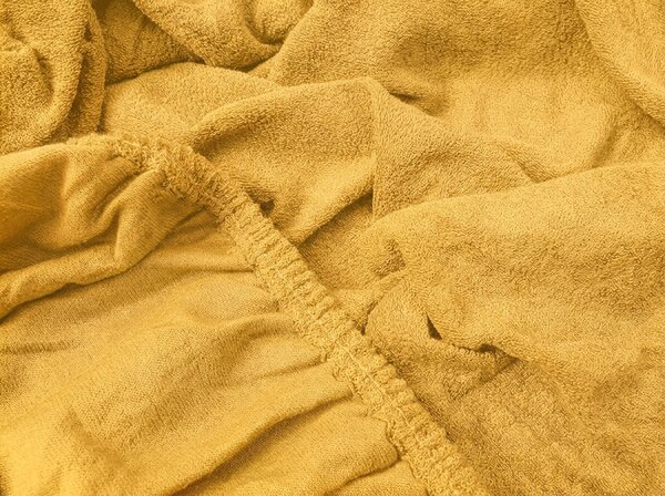 Frotte prześcieradło do dziecięcego łóżeczka PREMIUM 60x120 cm żółto-pomarańczowe