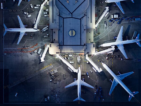 Ilustracja Airliners at gates and Control Tower at Lax, Michael H