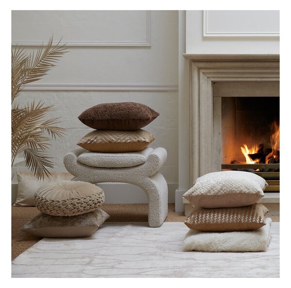 Kremowy puf z materiału bouclé Nafya – Light & Living