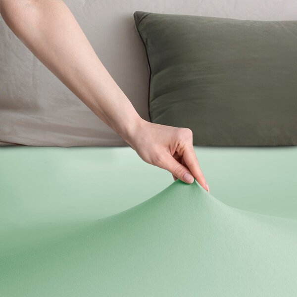 Jasnozielone dżersejowe prześcieradło z gumką 90x200 cm Amber – Restilo