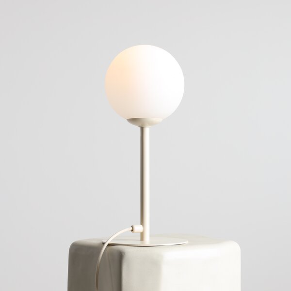 Nowoczesna i elegancka lampa stołowa Pinne w kolorze kremowym