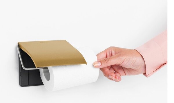 Ścienny stalowy uchwyt na papier toaletowy w kolorze złota ReNew – Brabantia