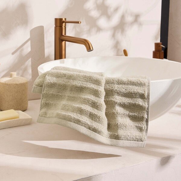 Beżowy bawełniany ręcznik frotte 30x50 cm Maya – douceur d'intérieur