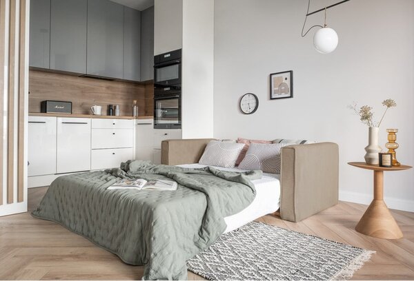 Beżowa rozkładana sofa 168 cm Lucky Lucy – Miuform