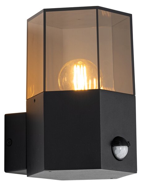 Lampa ścienna zewnętrzna czarna z przydymionym szkłem sześciokątnym i czujnikiem ruchu - Denmark