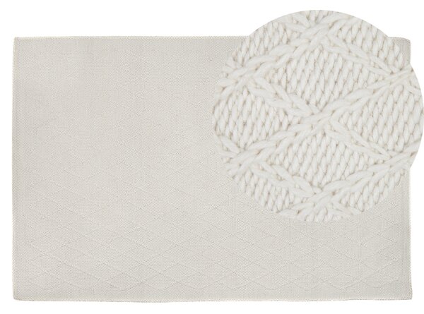 Prostokątny dywan 140x200cm do sypialni geometryczne przeszycia wełna biały Erzin Beliani